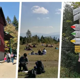 Widok na schronisko, ludzi odpoczywających na trawie i drogowskazy szlaków turystycznych, w tym do schroniska na Leskowcu.